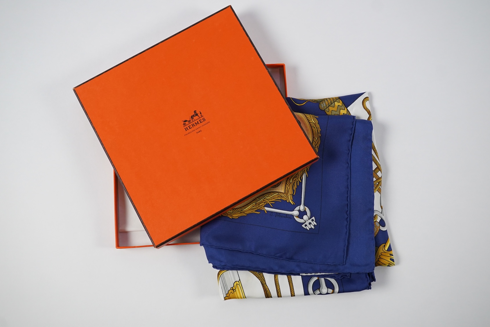 A Hermes navy Cliquetis silk scarf by Julia Abadie with box and Christmas outer box. 90 x 90cm